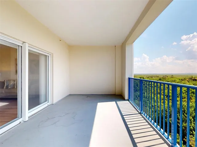 a view of entryway with wooden walls