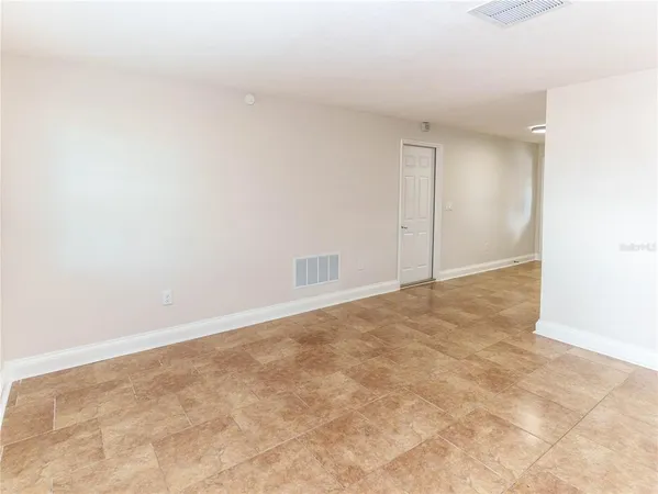 an empty room with an entryway