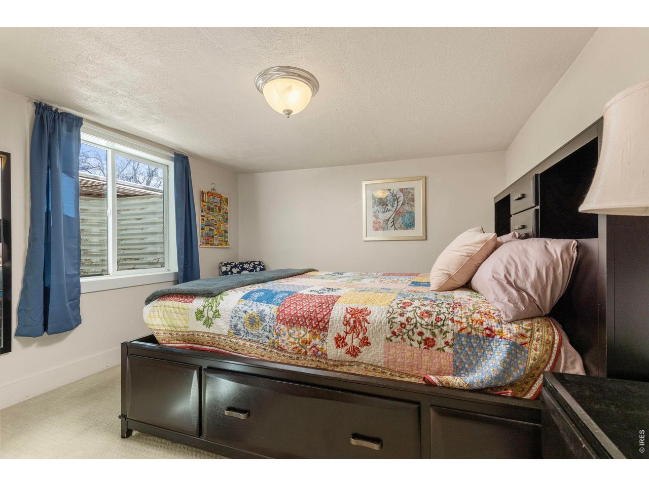 206 South Shields Street Fort Collins, CO 80521 - Photo 21 of 47 a bedroom with a bed and window