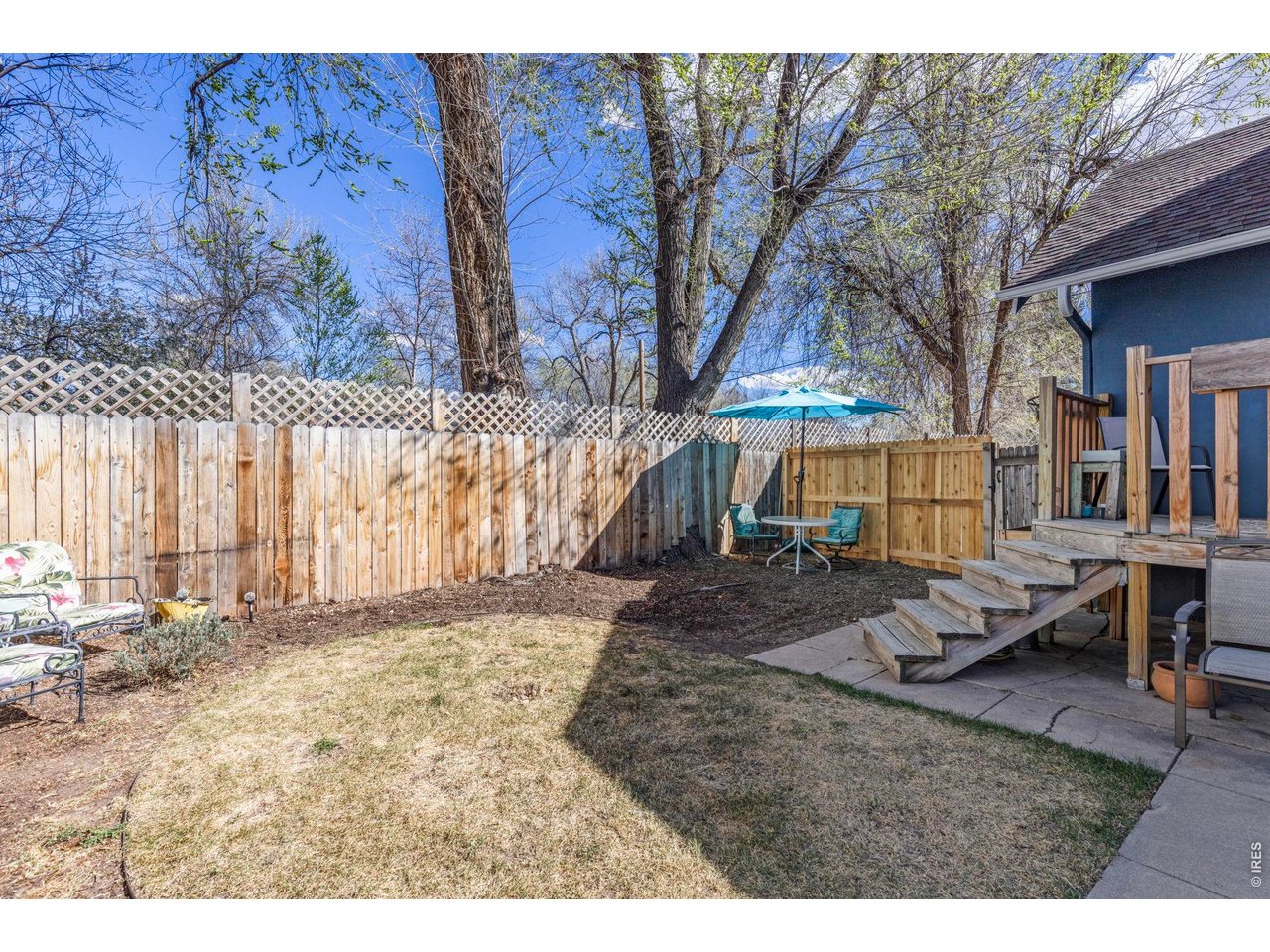 206 South Shields Street Fort Collins, CO 80521 - Photo 31 of 47 a backyard of a house with outdoor seating