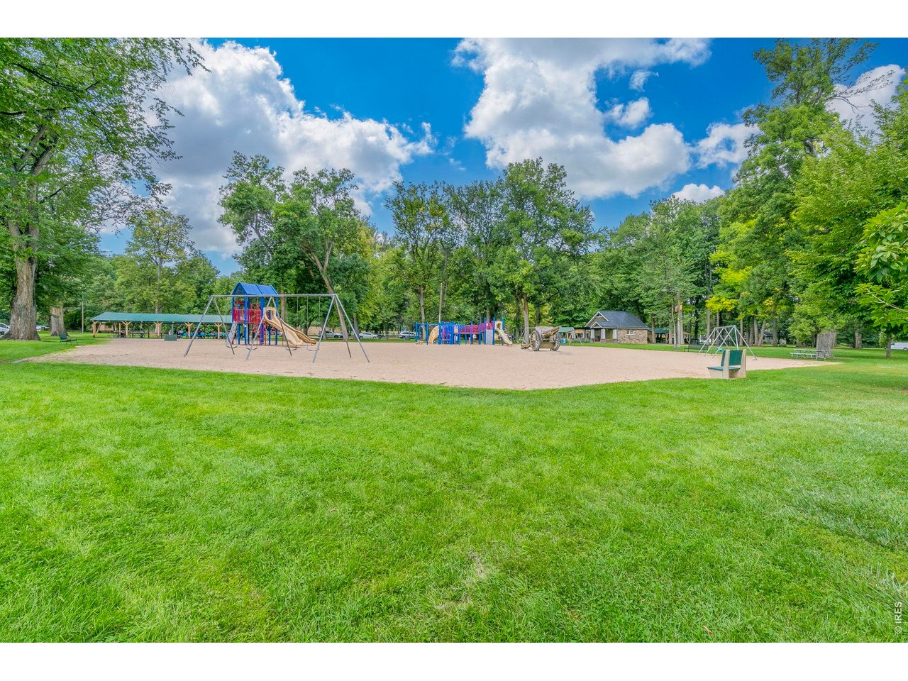 206 South Shields Street Fort Collins, CO 80521 - Photo 44 of 47 a view of a park with swings and slides