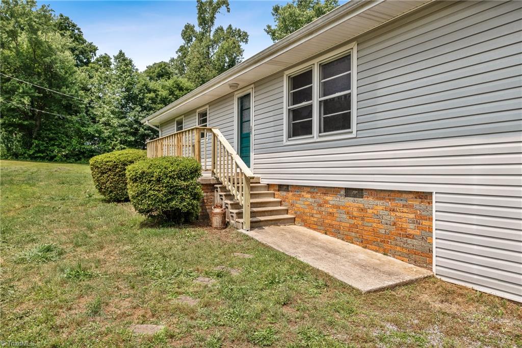 753 Wolf Island Road Reidsville, NC 27320 - Photo 3 of 42 Front porch with new railing