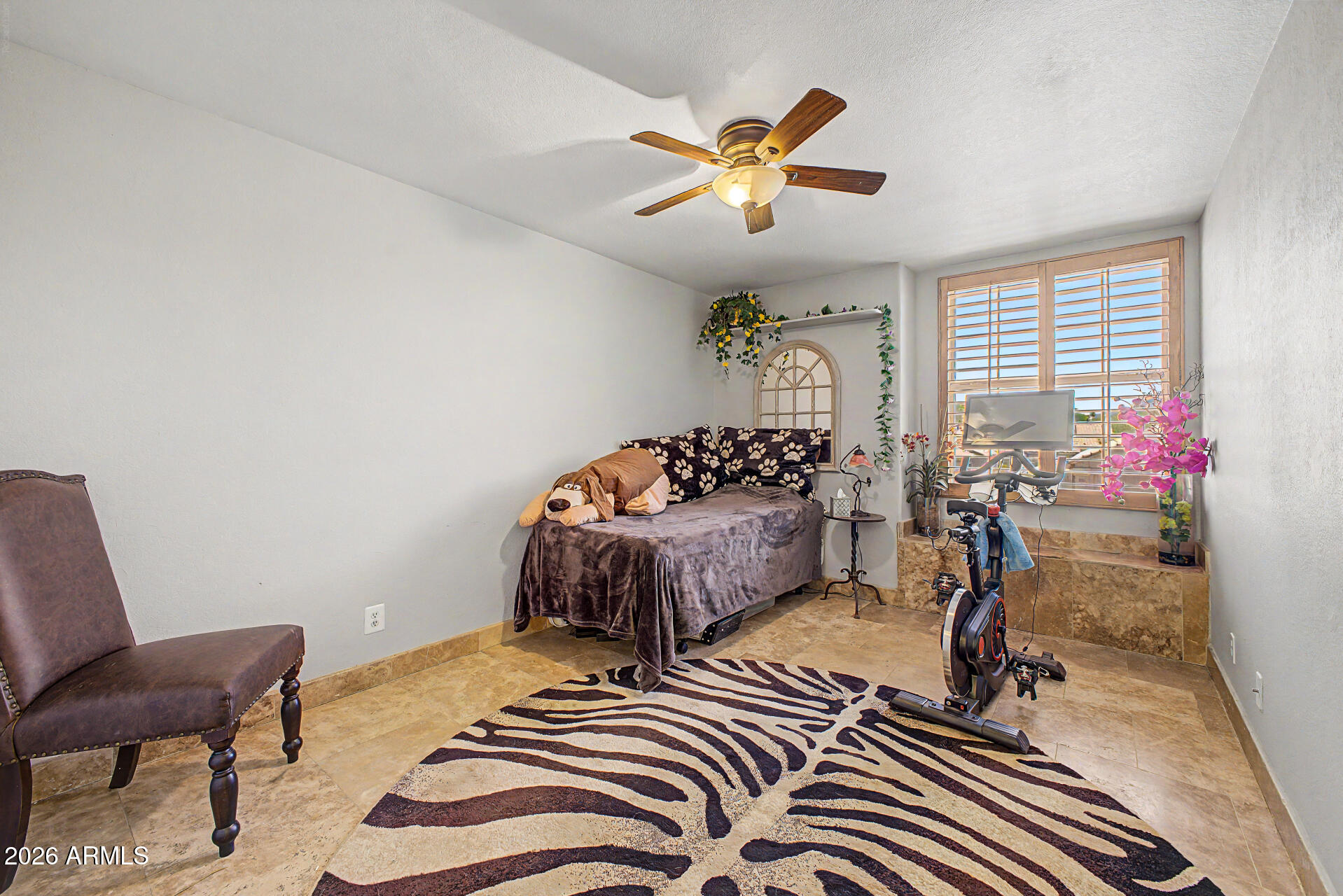 3948 North Ranier Mesa, AZ 85215 - Photo 30 of 69 a spacious bedroom with a bed and a chandelier