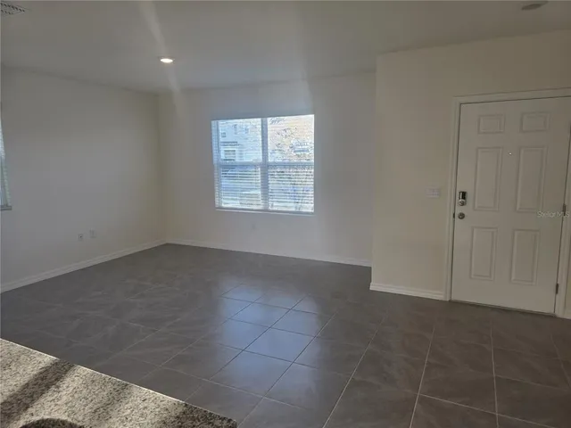 a kitchen with a stove microwave and refrigerator