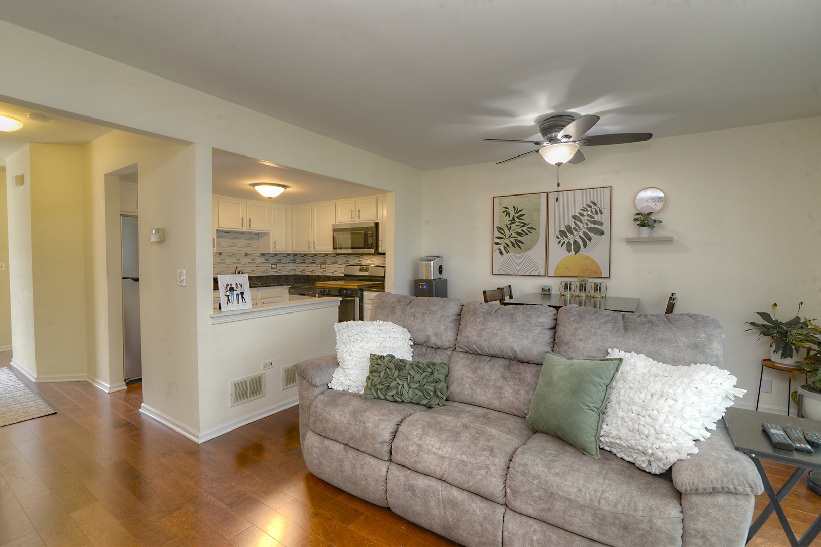 1063 Horizon Ridge Lake In The Hills, IL 60156 - Photo 6 of 27 a living room with furniture and a view of kitchen