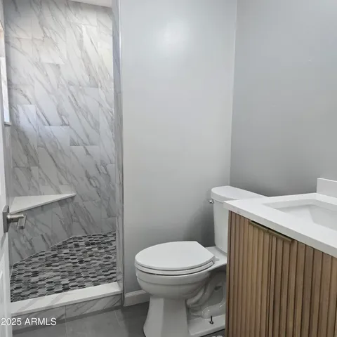 a bathroom with a sink and a toilet