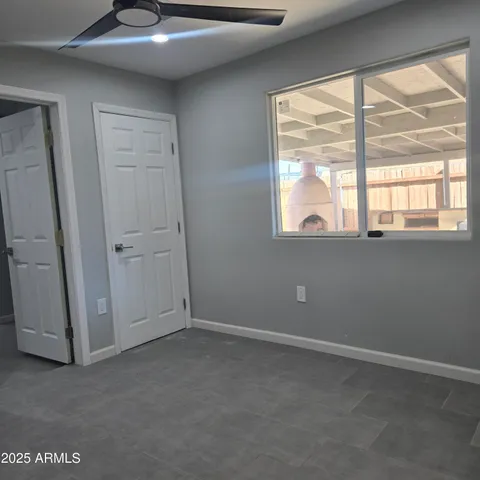 an empty room with windows