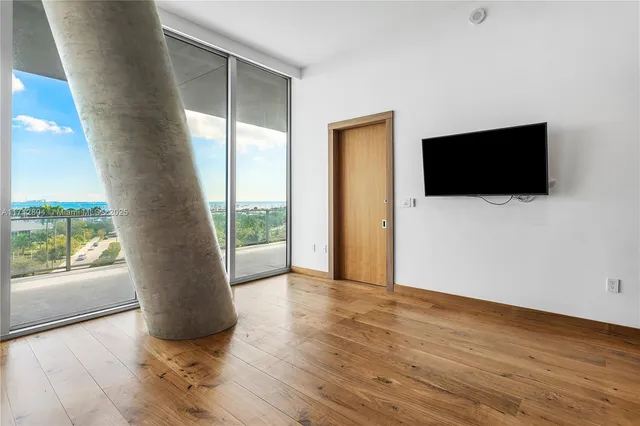 a view of a livingroom with a flat screen tv