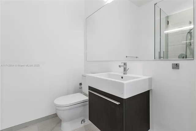 a bathroom with a sink and a toilet