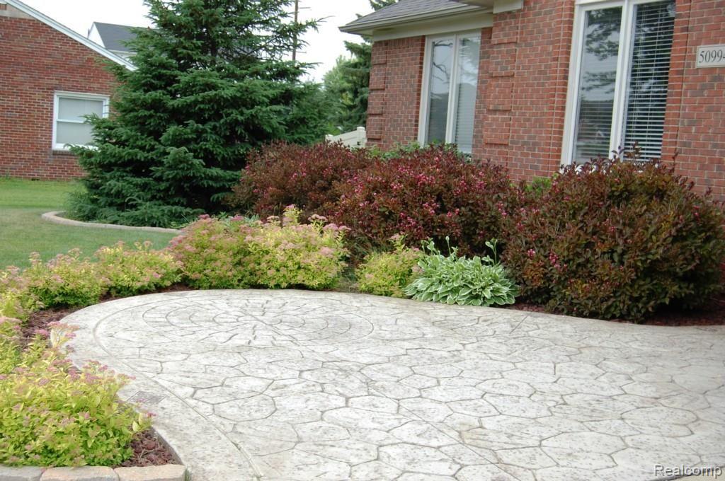 50994 Nesting Ridge Drive Macomb, MI 48044 - Photo 2 of 24 Front Walk