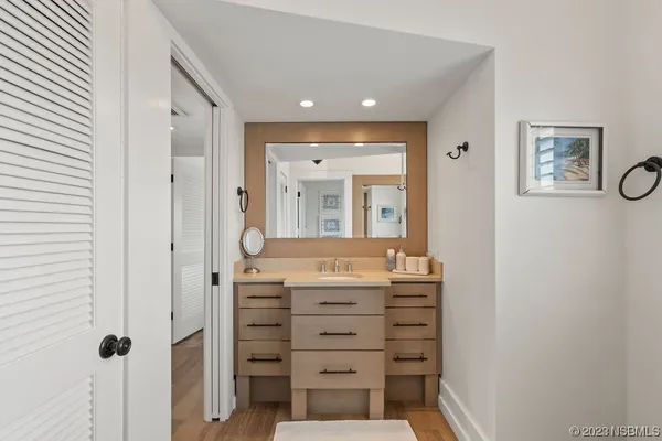a bathroom with a toilet a sink and a shower