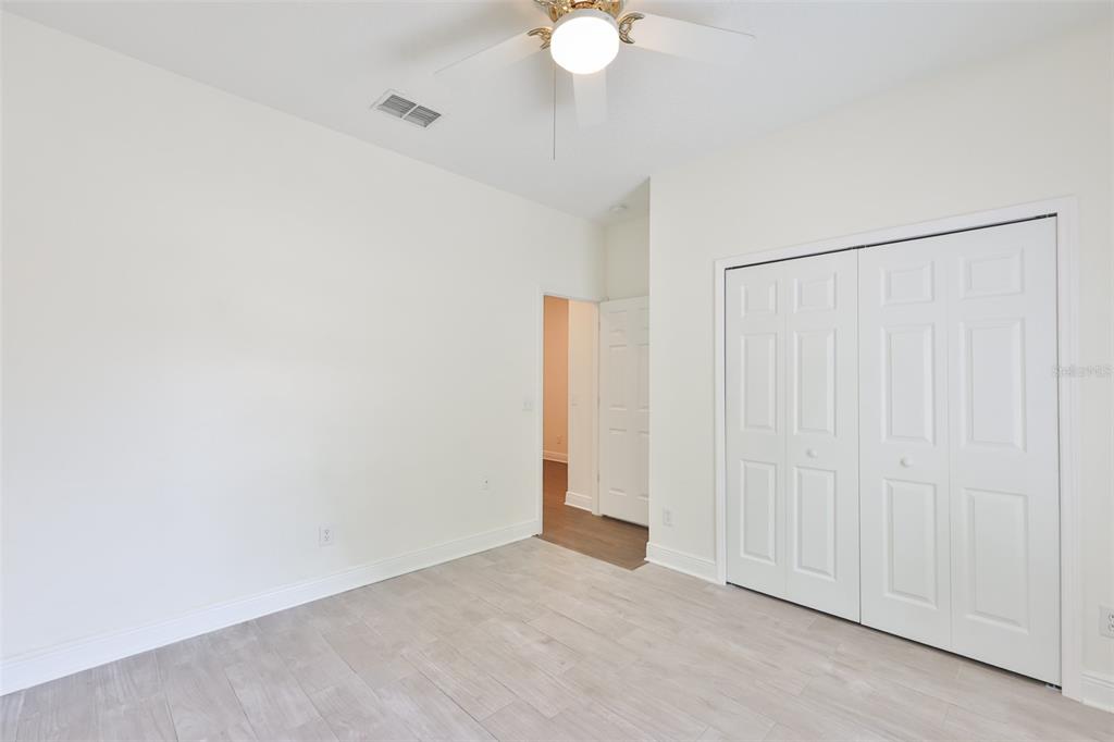 708 Coade Stone Drive Seffner, FL 33584 - Photo 25 of 48 a view of an empty room