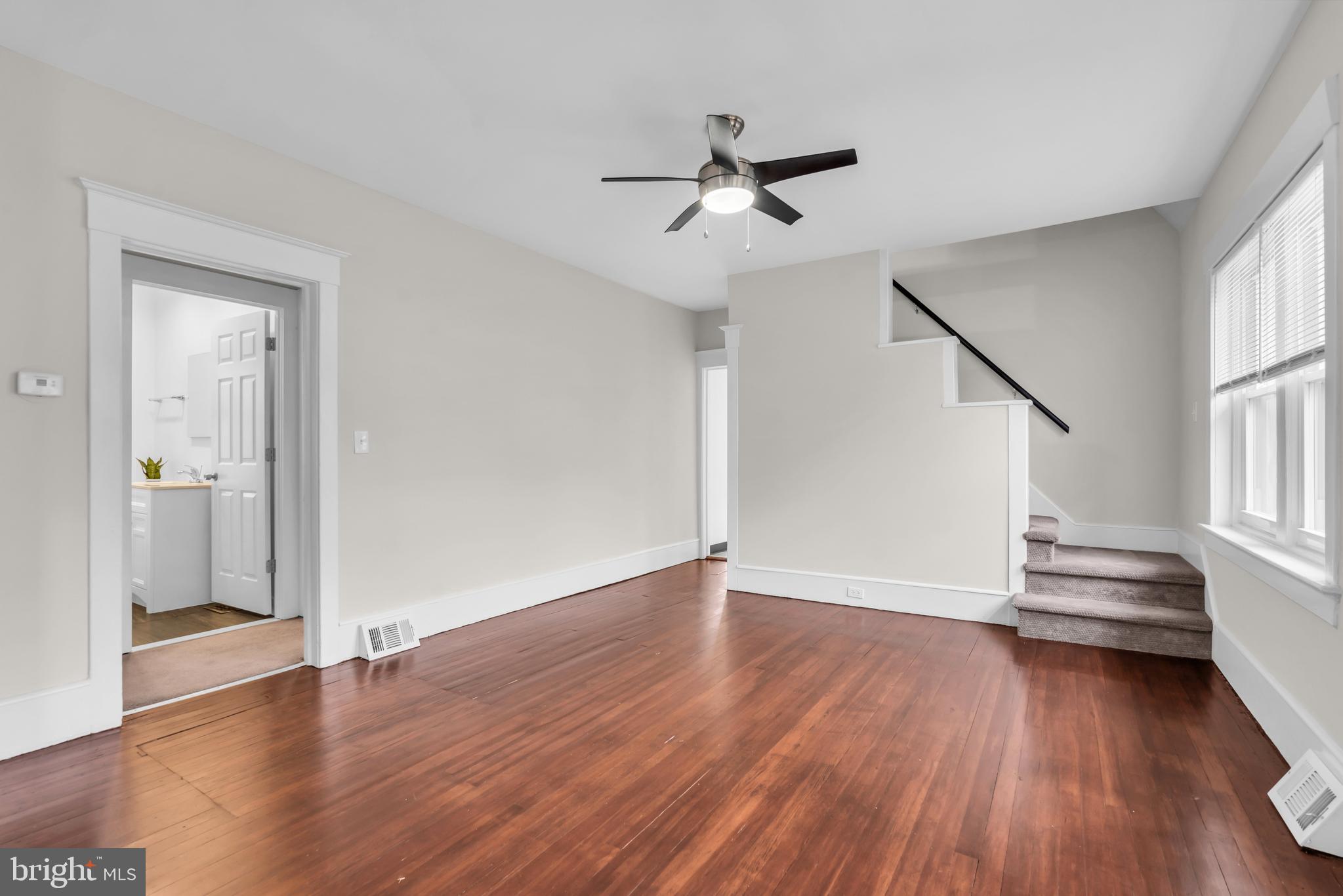 29 Saybrook Avenue Trenton, NJ 08619 - Photo 11 of 31 a view of empty room with wooden floor and fan