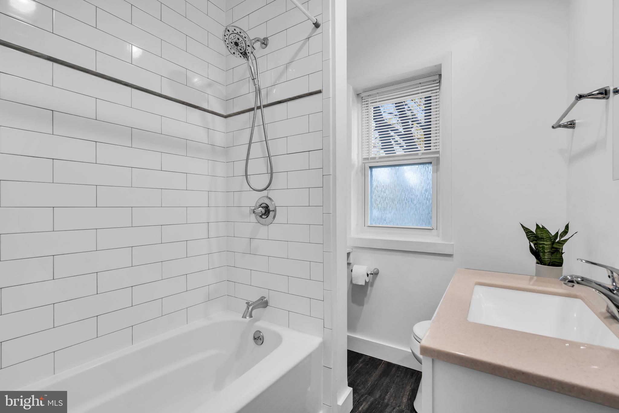 29 Saybrook Avenue Trenton, NJ 08619 - Photo 19 of 31 a bathroom with a bathtub and shower