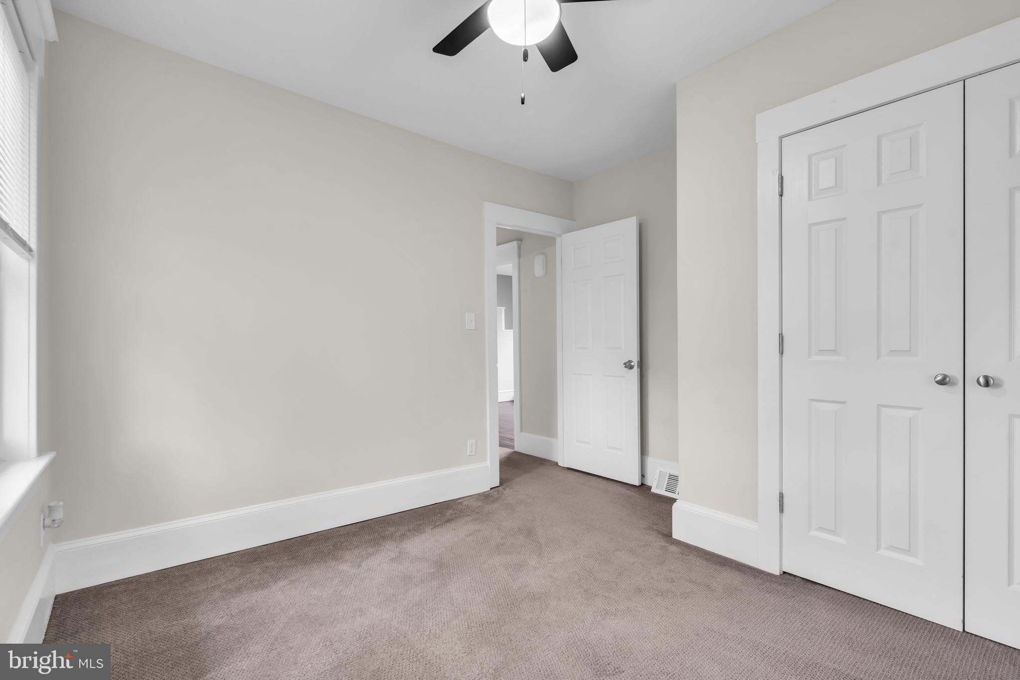 29 Saybrook Avenue Trenton, NJ 08619 - Photo 21 of 31 an empty room with chandelier fan