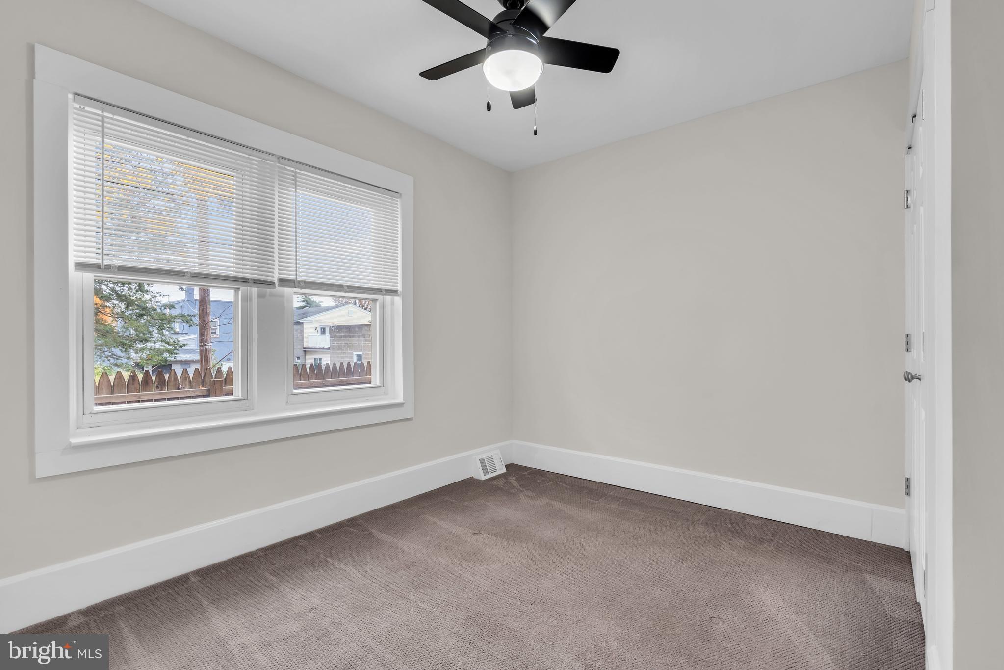29 Saybrook Avenue Trenton, NJ 08619 - Photo 24 of 31 a view of an empty room with a window