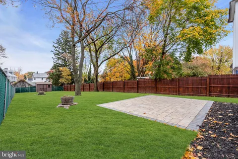 a view of a backyard with a garden
