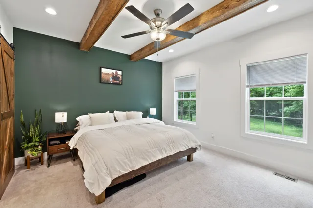 a bathroom with a shower and a toilet