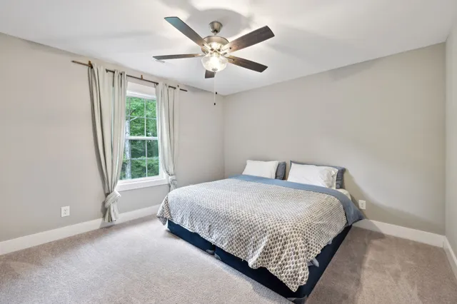 a room with bed and a window