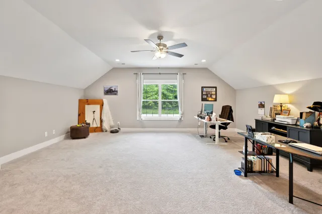 a view of a deck with wooden floor and outdoor seating