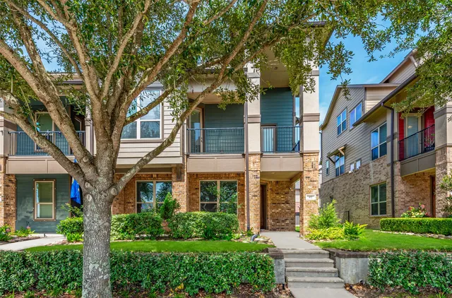 a front view of a multi story residential apartment buildings