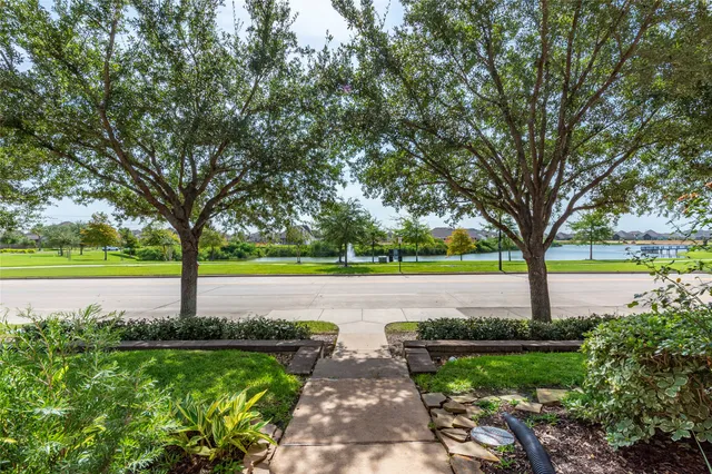 a view of a garden with a fountain