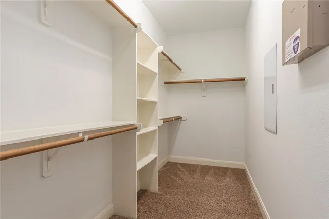 a bathroom with a sink vanity and a mirror