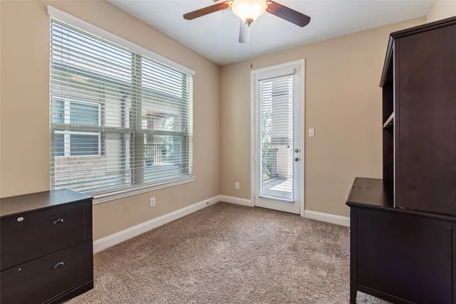 a view of a balcony with wooden floor