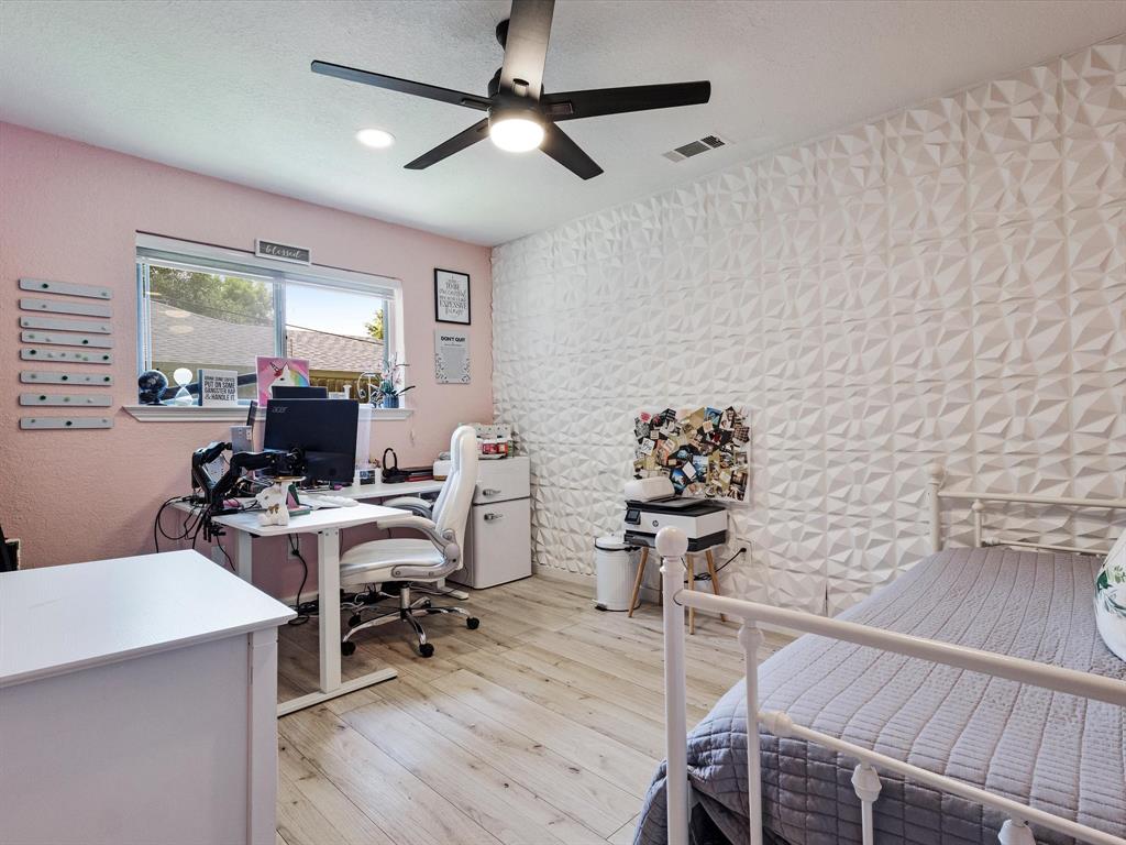 108 Sunview Street Sunnyvale, TX 75182 - Photo 10 of 29 a view of a workspace with furniture and a window