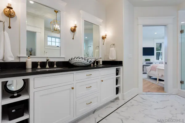 a bedroom with a bed and dresser