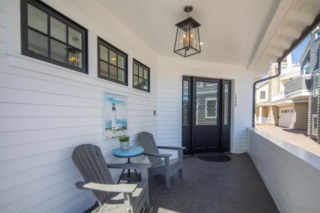a view of a livingroom with furniture and windows