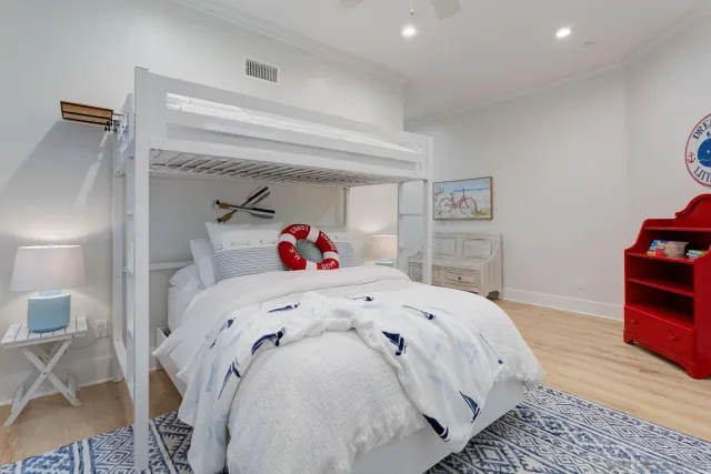 a bathroom with double sink and a mirror
