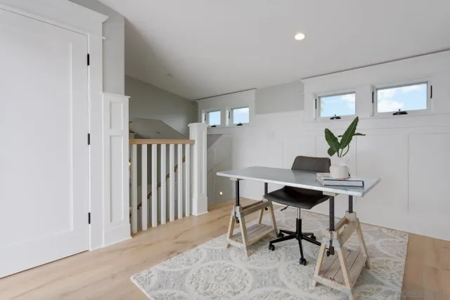 a view of a chairs and table in patio