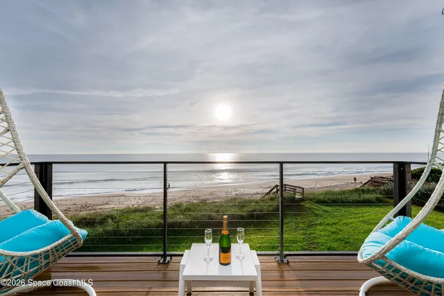 a bathroom with a double vanity sink a toilet and mirror