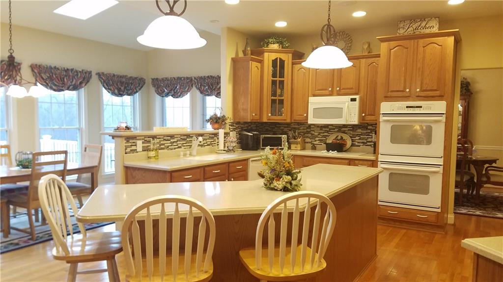 1003 Timber Ridge Court Harrison City, PA 15636 - Photo 7 of 25 OPEN KITCHEN WITH EATING AREA IS GREAT FOR ENTERTAINING!