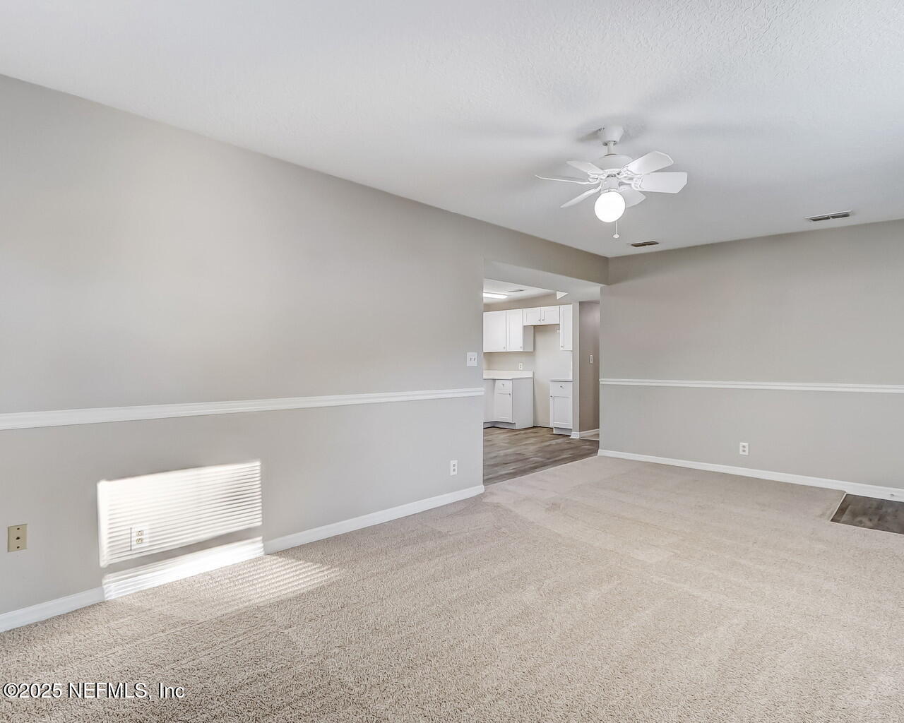 2028 Hartridge Street Jacksonville, FL 32209 - Photo 17 of 33 an empty room with windows and fan