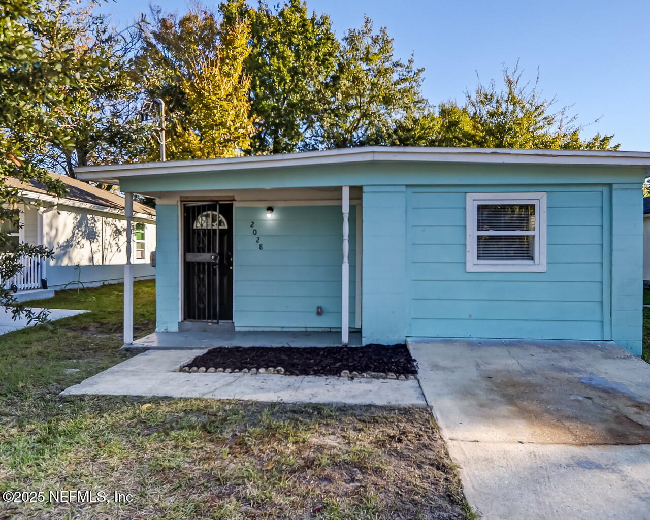 2028 Hartridge Street Jacksonville, FL 32209 - Photo 2 of 33 a view of a house with a yard