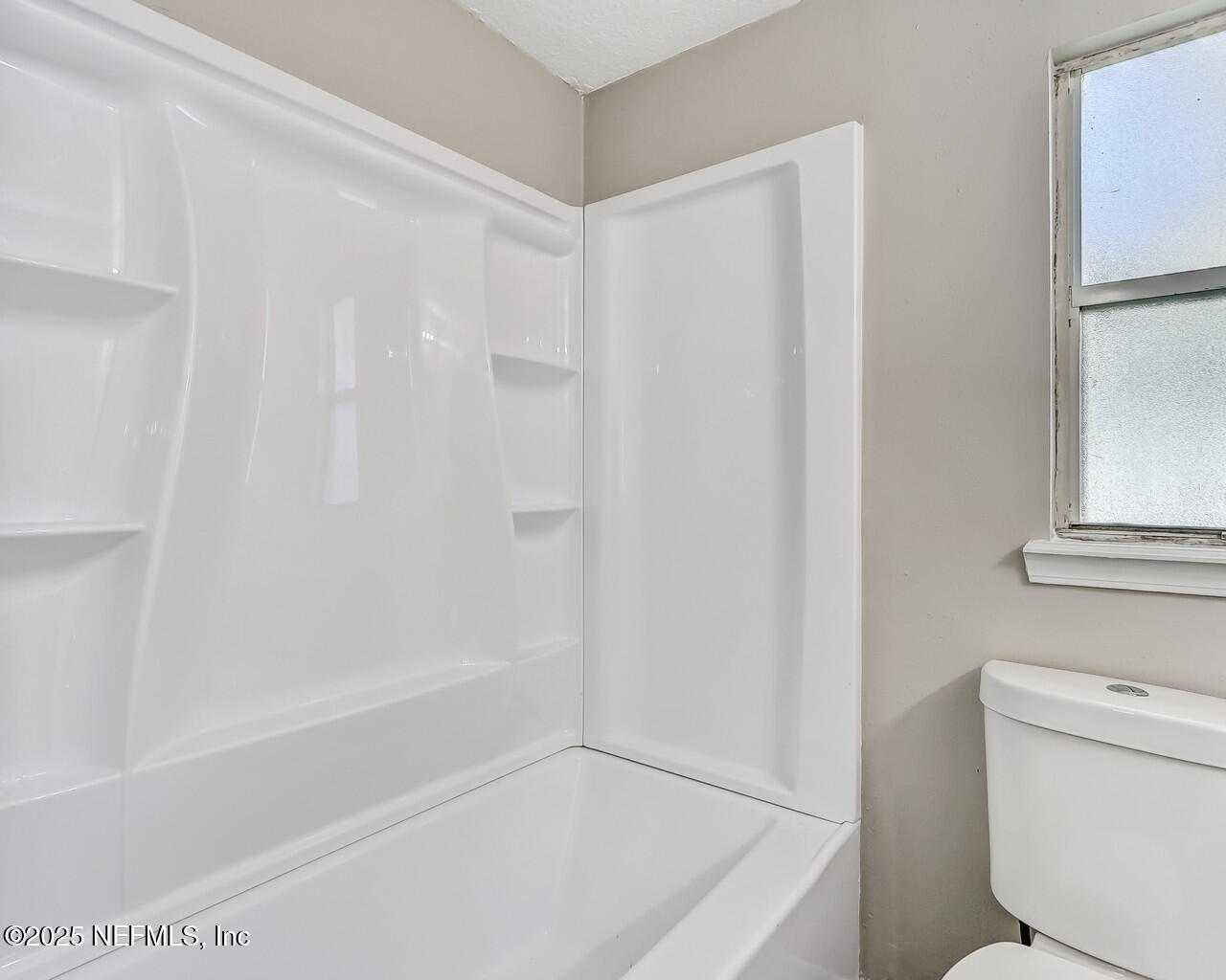 2028 Hartridge Street Jacksonville, FL 32209 - Photo 21 of 33 a bathroom with a bathtub and a toilet