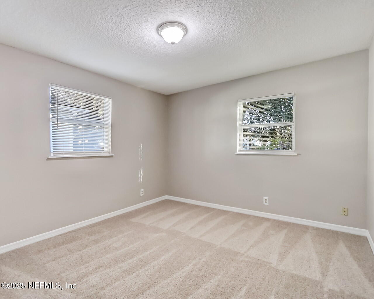 2028 Hartridge Street Jacksonville, FL 32209 - Photo 28 of 33 a view of room with window and closet