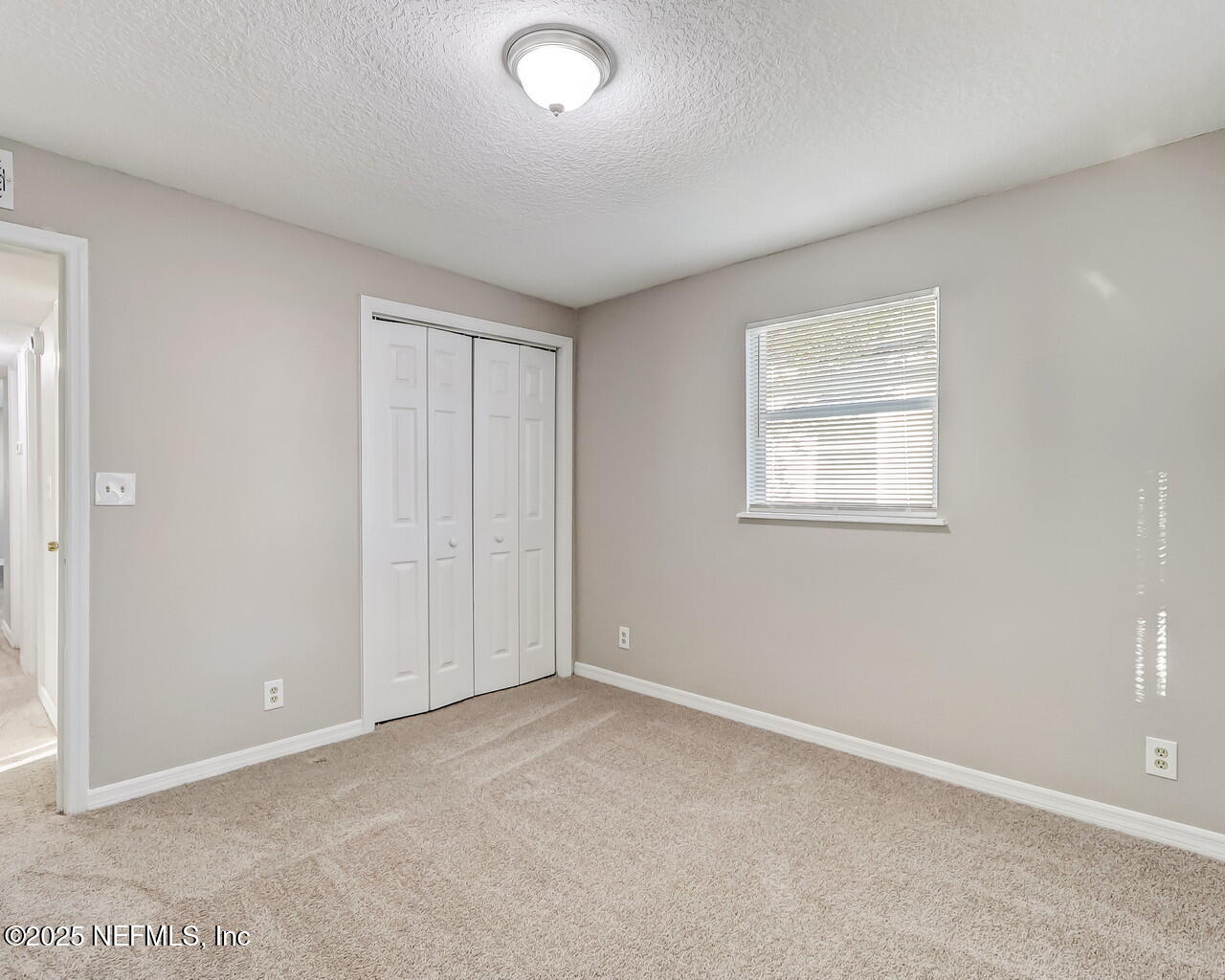 2028 Hartridge Street Jacksonville, FL 32209 - Photo 29 of 33 an empty room with windows