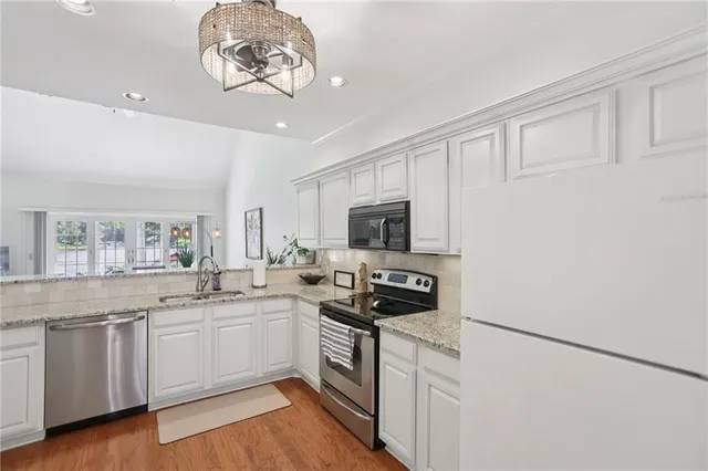 a view of a front of house with a street