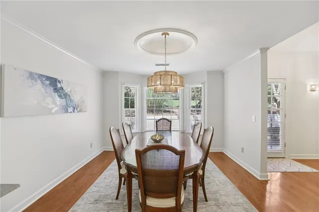 a view of a lake with houses in the background