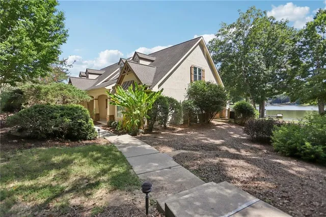a view of a chair and table in the balcony