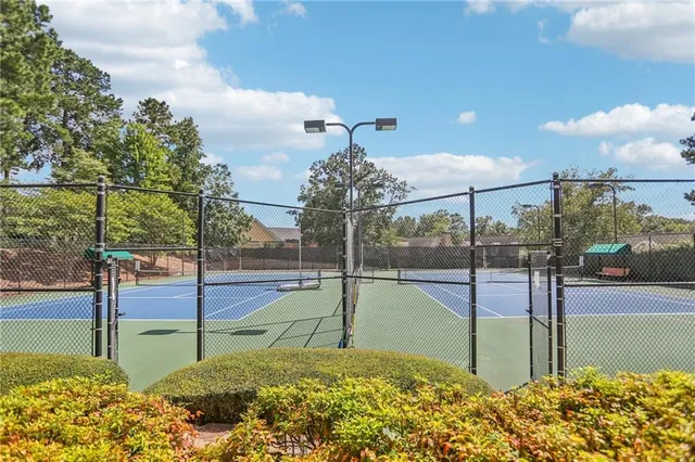 a bathroom with a sink vanity and a mirror