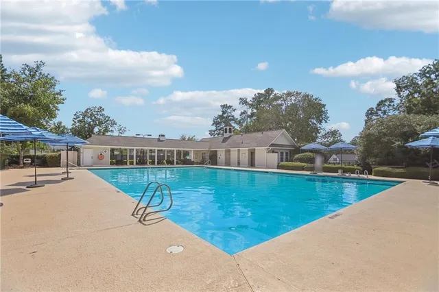 a en suite bathroom with a sink double vanity and a mirror
