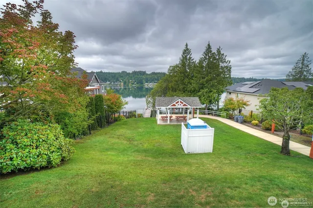 an aerial view of a house with outdoor space