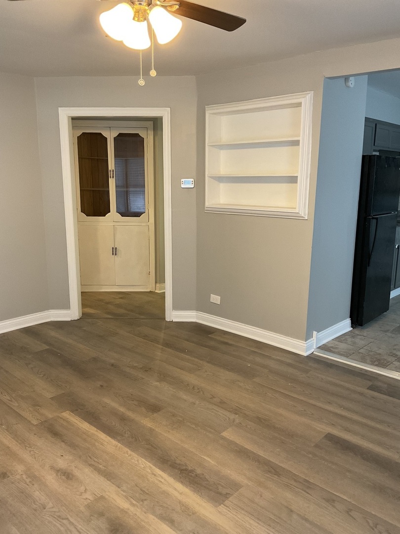 17031 Trapet Avenue Hazel Crest, IL 60429 - Photo 4 of 13 a view of an empty room with a window