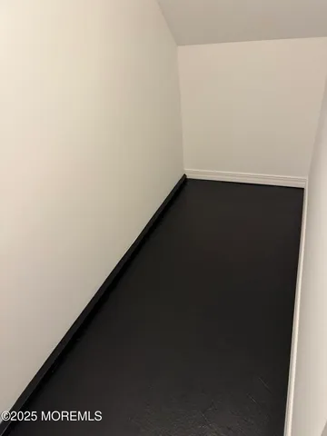 a sign that is on a brick wall