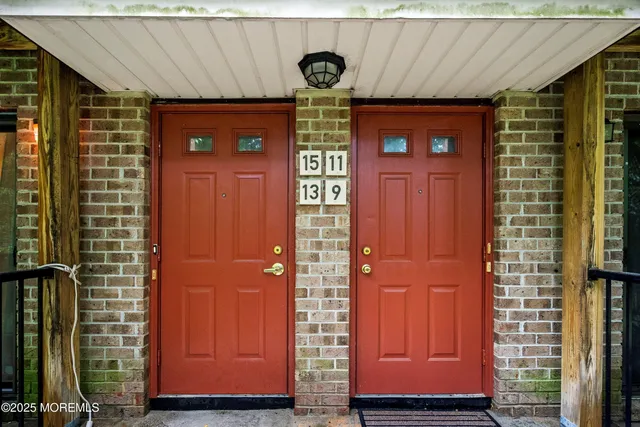a front view of a house with parking space