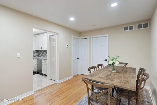 a view of a dining room with furniture